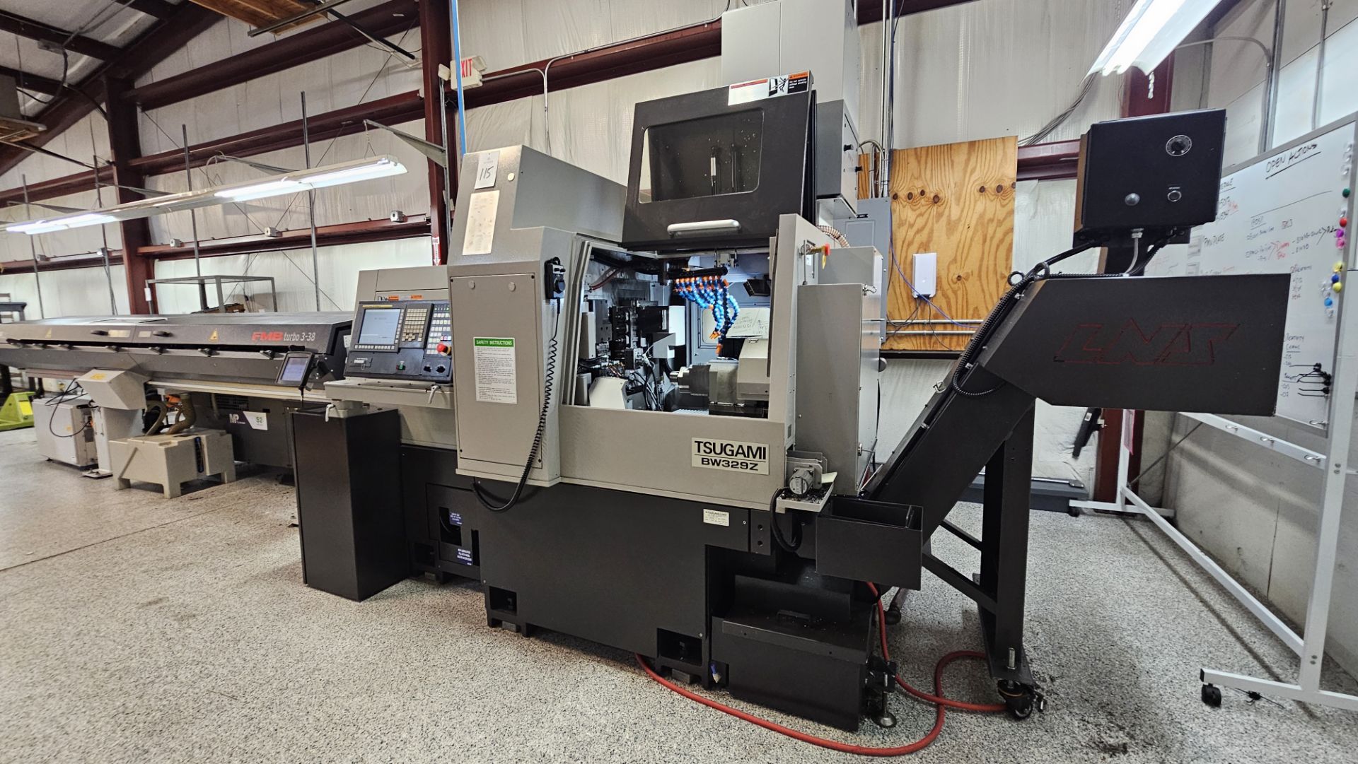 Tsugami BW329Z 9-Axis Swiss-Type CNC Automatic Lathe with bar feeder and control panel