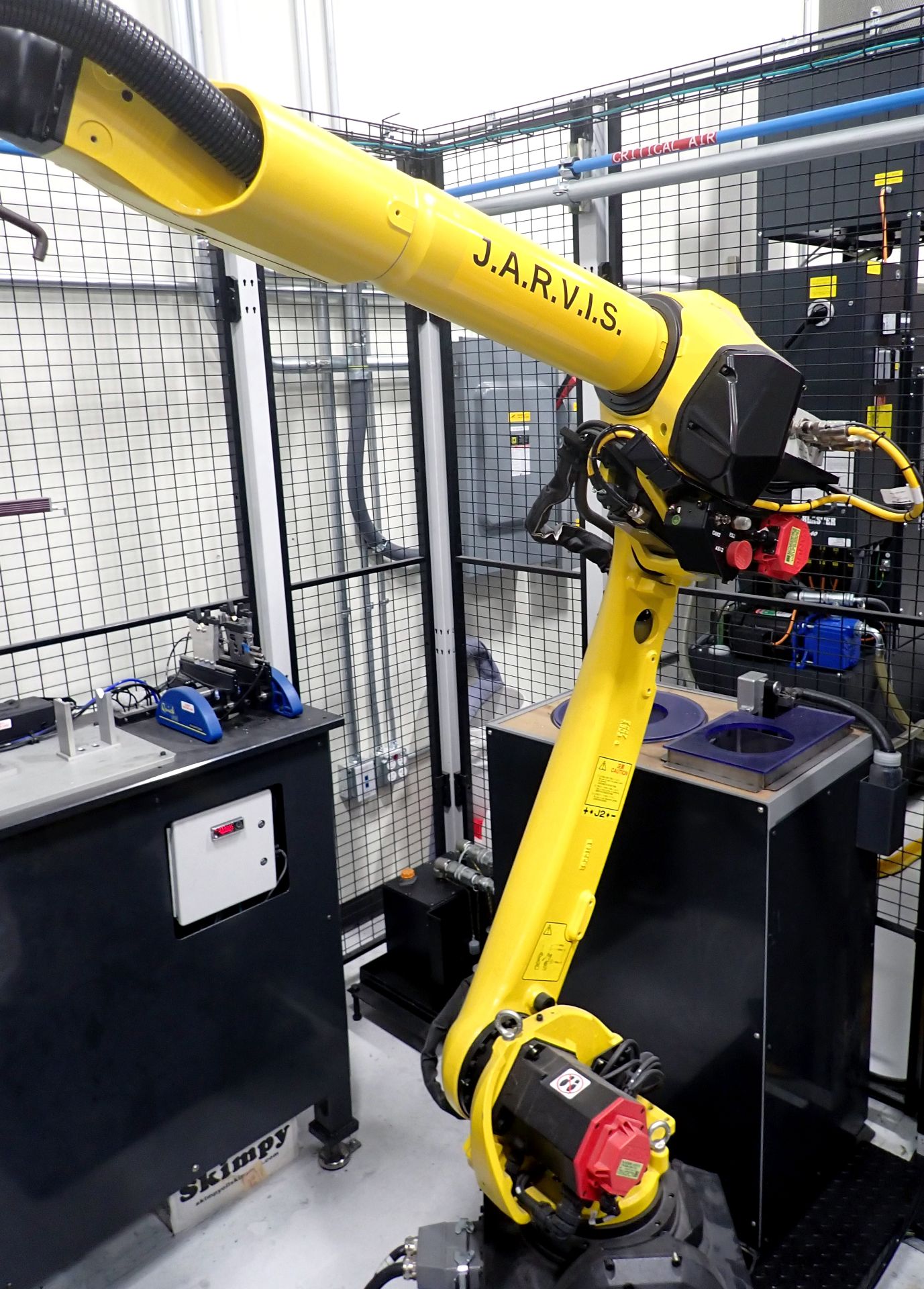Fanuc M-10iD/8L 6-axis robotic cell with controller, marking station, and safety fencing